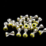 nickel/yellow pupil